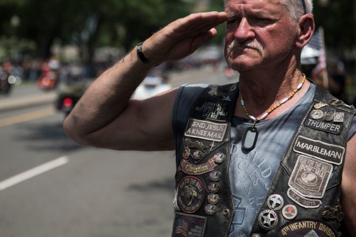 FILE: A U.S. veteran salutes as thousands of bikers and military veterans take part in the Rolling Thunder motorcycle parade in Washington DC, on May 27, 2018. /