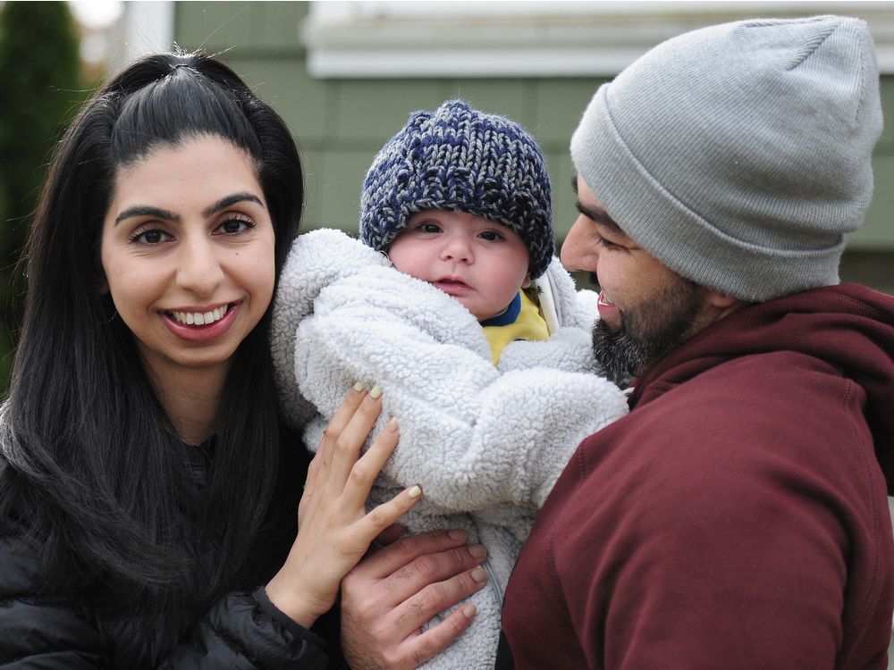 japleen gill, with baby jeevan and her husband, gaurav, at home in vancouver on march 4.