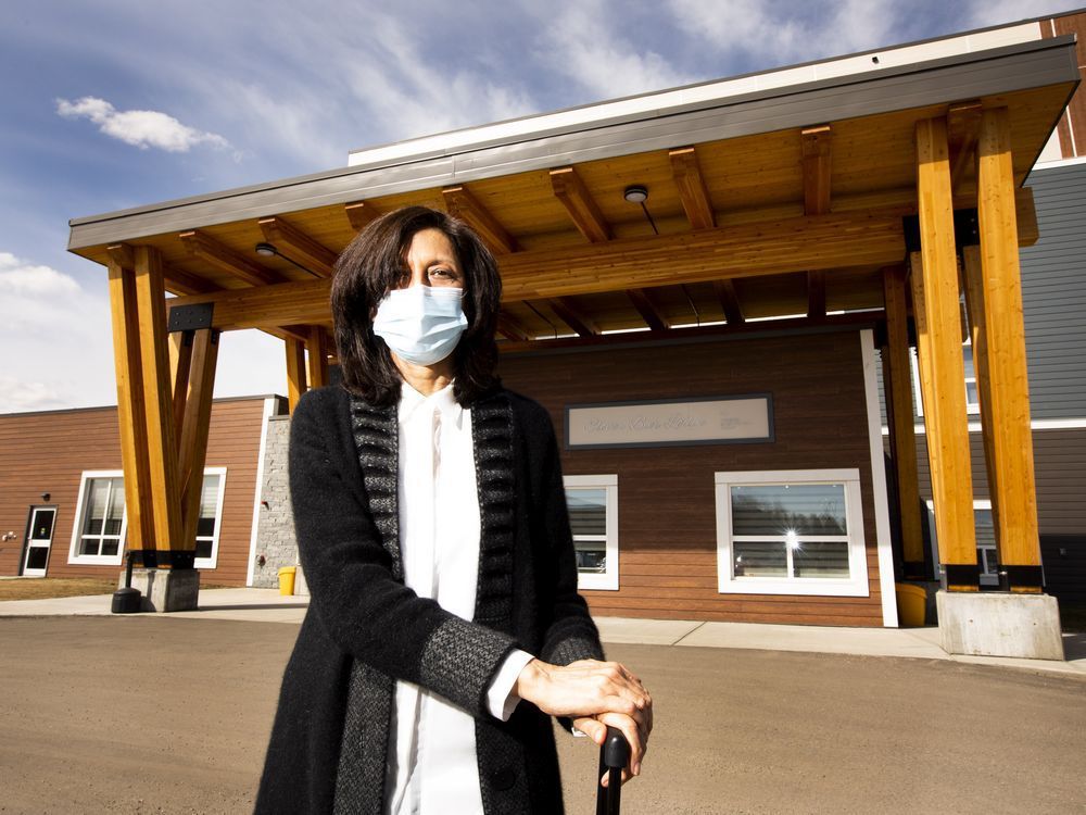 University of Alberta associate professor Jasneet Parmar in front of Clover Bar Lodge in Sherwood Park. Parmar points to Clover Bar is one facility that works hard to support and include family caregivers despite pandemic restrictions.