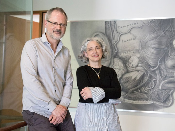  Woolridge and Jenkinson pose in front of an enlarged illustration by Chubb (photo by Romi Levine)