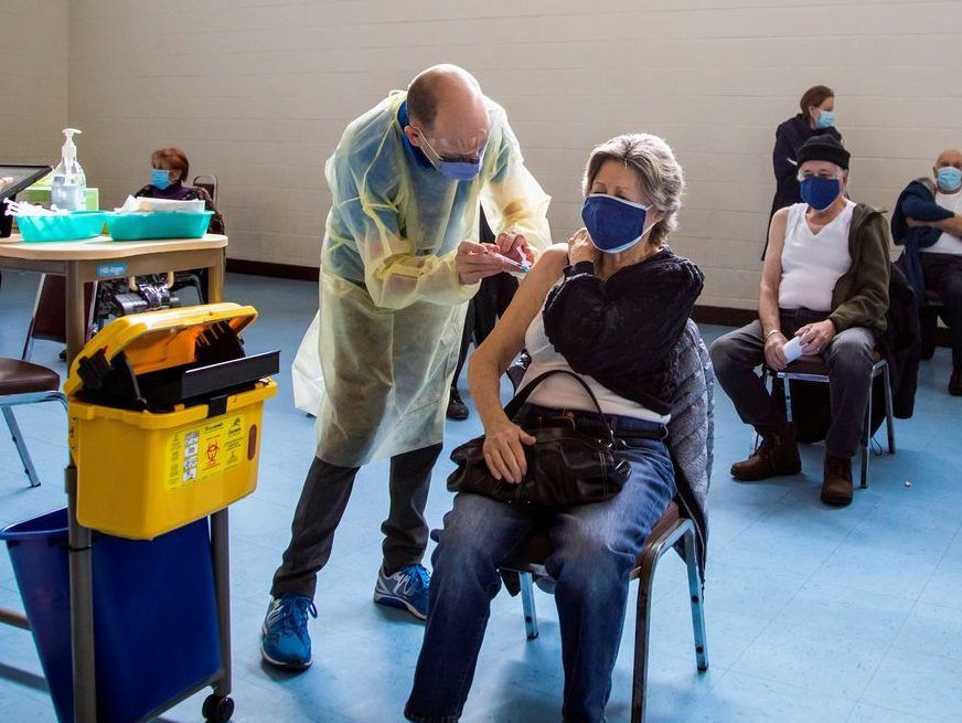 A nurse from Humber River Hospital administers the Pfizer/BioNTech COVID-19 vaccine at St Fidelis Parish in Toronto, Ontario, Canada March 17, 2021.