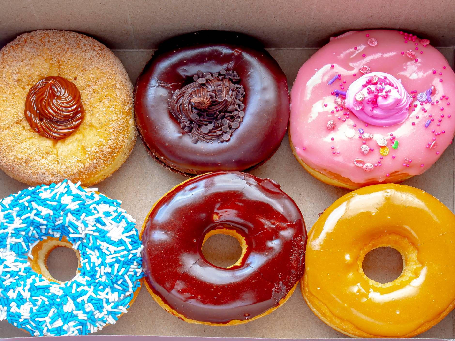 Krispy Kreme is offering a year of free  donuts to the vaccinated in 2021. Should the innoculated get a reward?