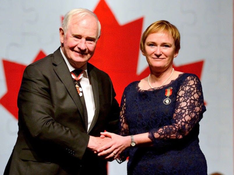 Robin McGee, right, was awarded the Sovereign's Medal for Volunteers.