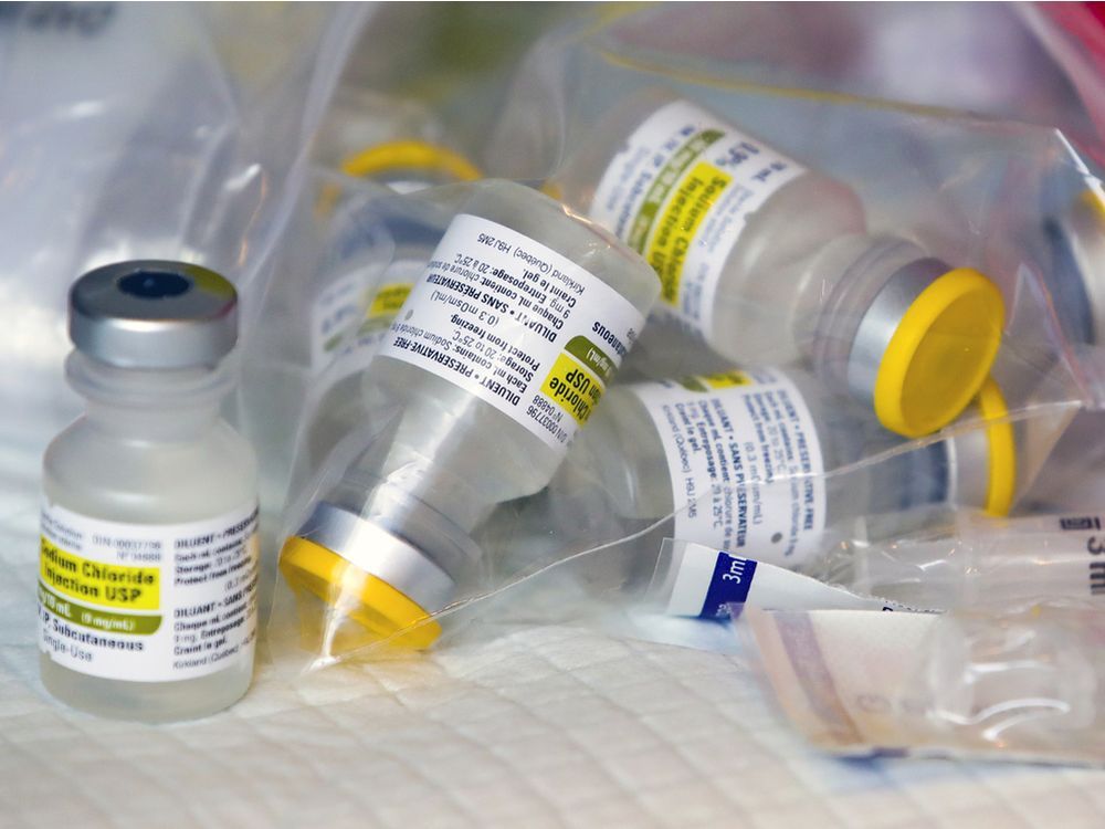 empty vials of the pfizer-biontech vaccine.