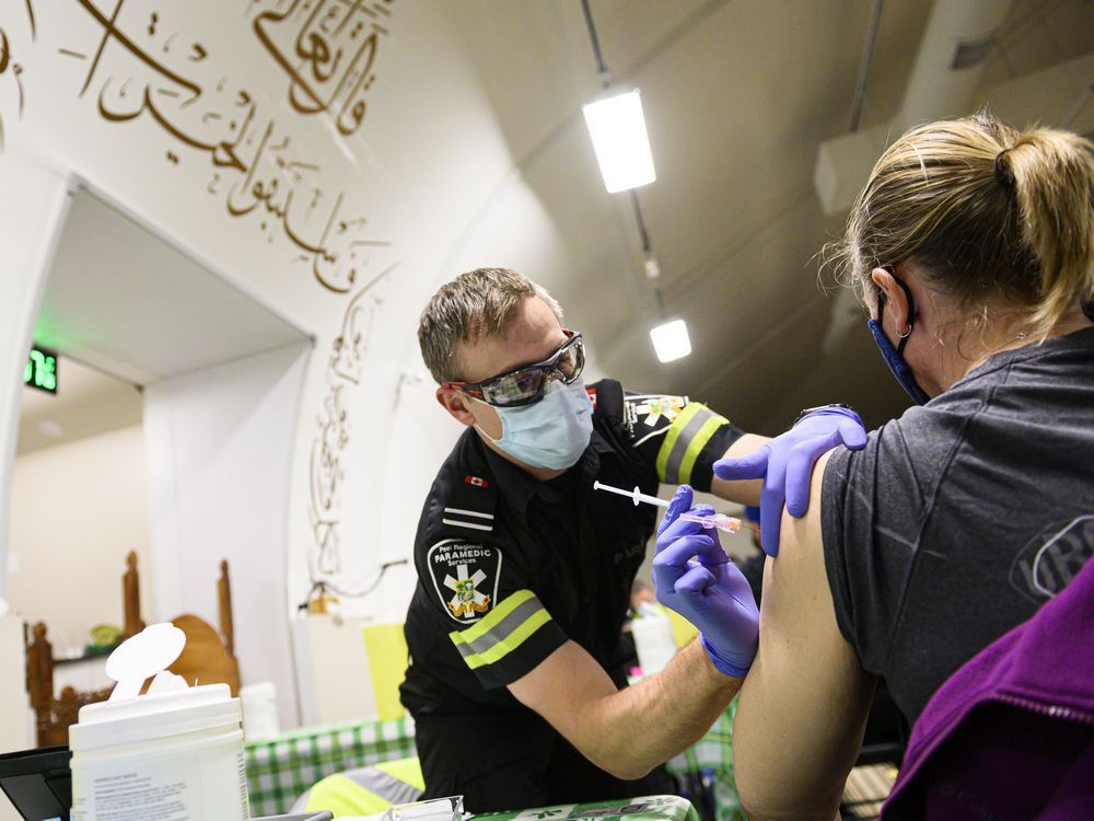 peel region paramedic ryan kingsborough, administers a dose of the moderna covid-19 vaccine, at a one-day pop-up vaccination clinic in mississauga, ont., on thursday, april 29, 2021.