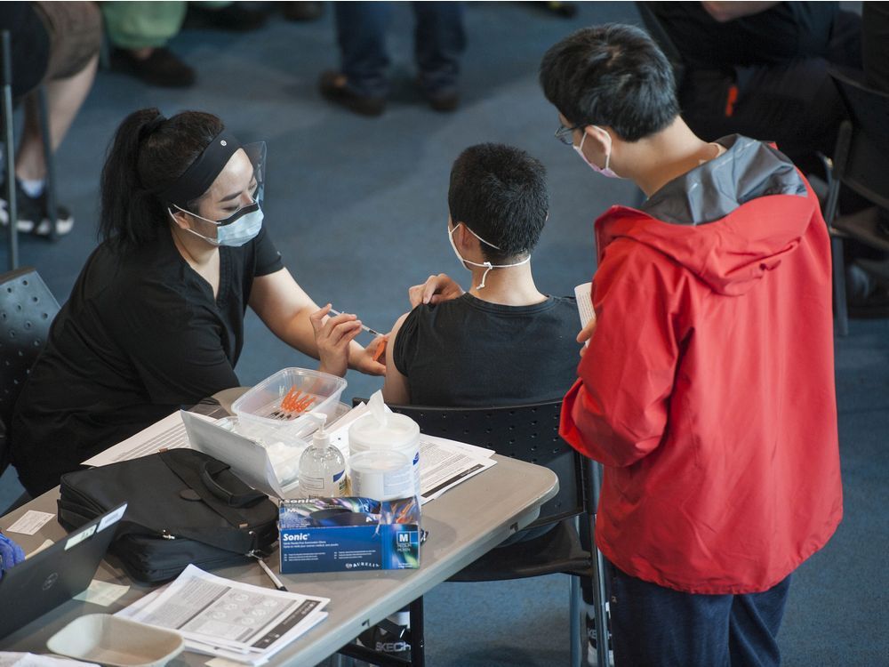 hundreds of surrey residents receive their covid-19 vaccination at a pop-up clinic at the surrey sports and leisure complex on saturday, may 22, 2021.