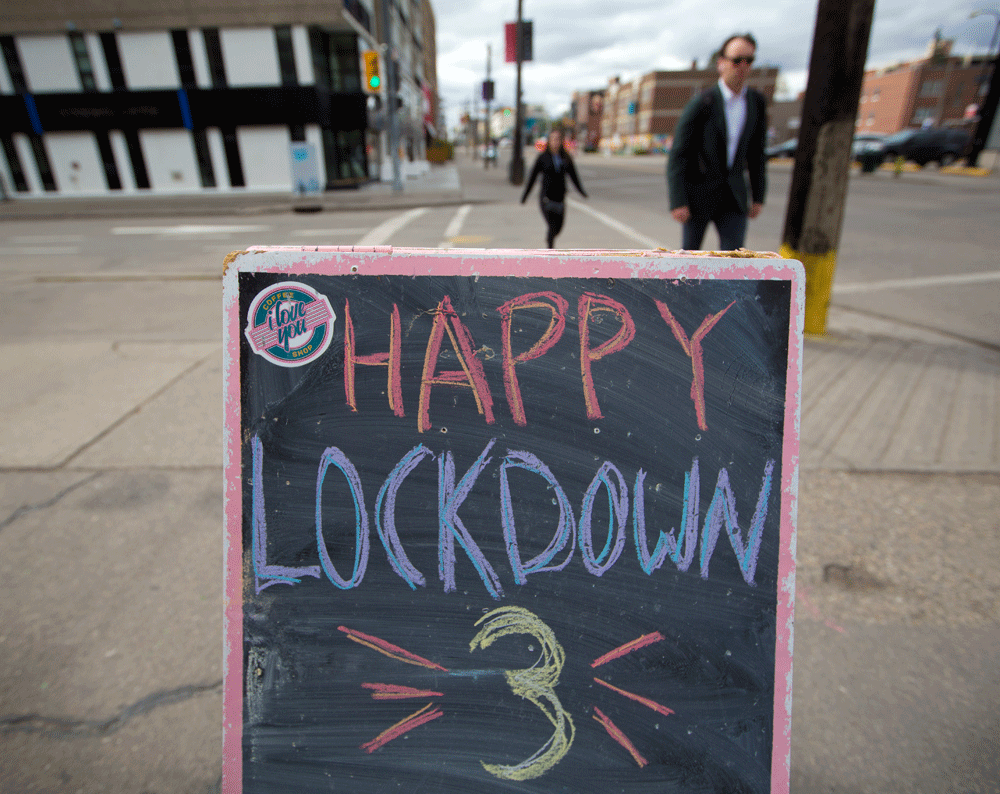 a sidewalk sign reflects some of the frustration of calgarians amid the latest covid restrictions. alberta had the highest percentage of people who responded in a poll that they've lost trust in the federal and provincial governments.