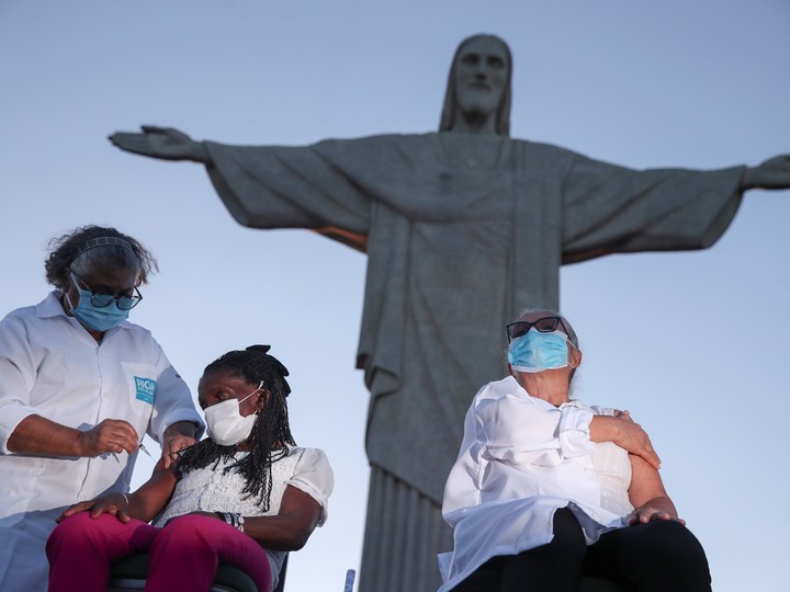  Teresinha Conceicao receives the Sinovac coronavirus disease (COVID-19) vaccine at Christ the Redeemer statue in Rio de Janeiro, Brazil January 18, 2021.