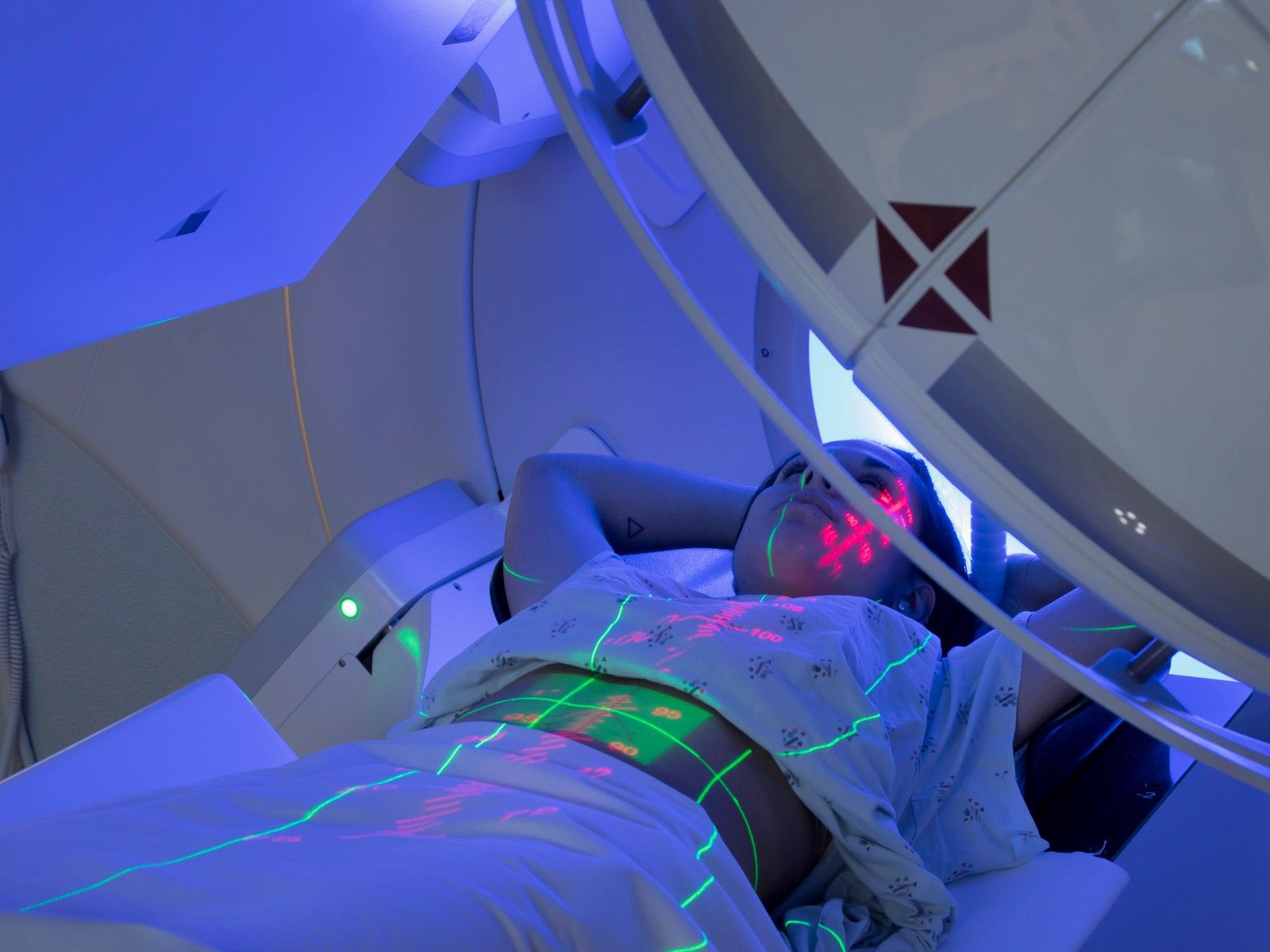 A file photo of a woman receiving radiation therapy.