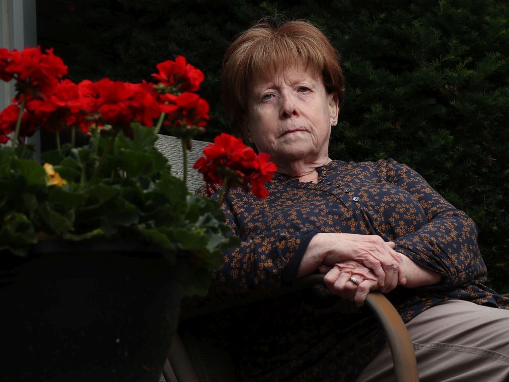 sheila logan poses for a photo outside her home in ottawa thursday. sheila is unable to get one of the mrna vaccines because of the risk of anaphylaxis.