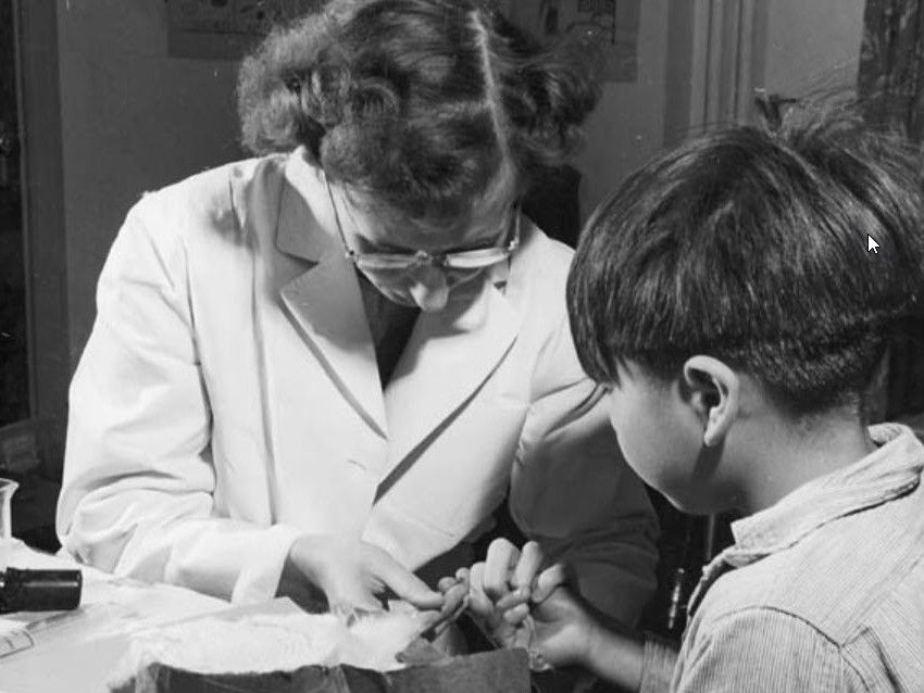 A nurse takes a blood sample from a boy at the Indian Residential School in Port Alberni, B.C. during a medical and dental survey conducted by the Department of National Health and Welfare in 1948.