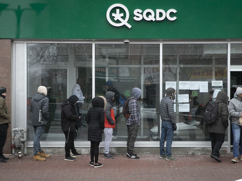 while consumption of booze and tobacco has been decreasing in quebec, cannabis use has been pretty stable, a new survey found. above: customers wait outside an sqdc outlet in this file photo.