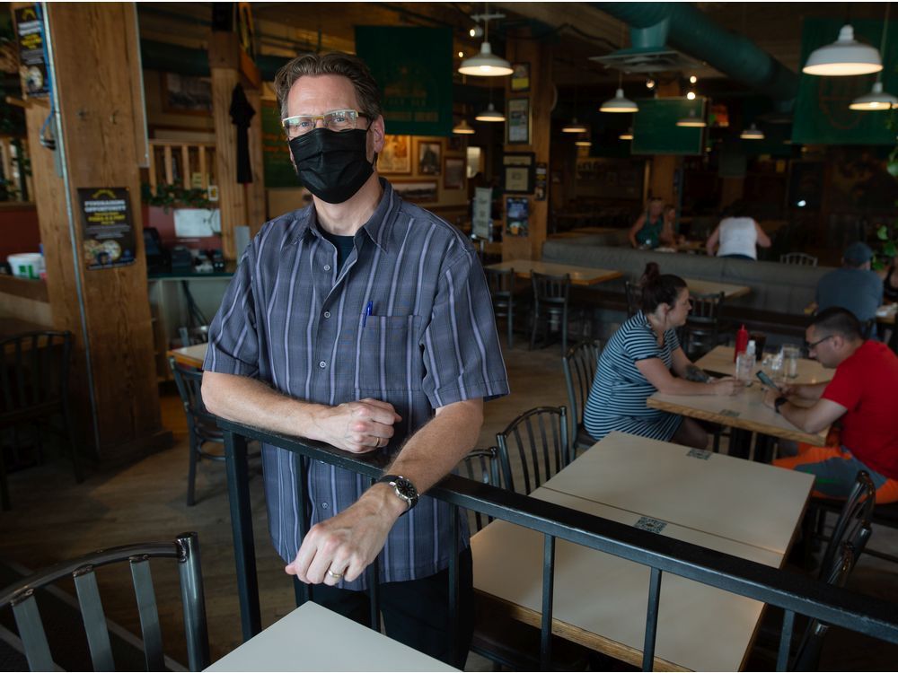 bar manager grant frew stands in bushwakker brew pub on dewdney avenue in regina, saskatchewan.