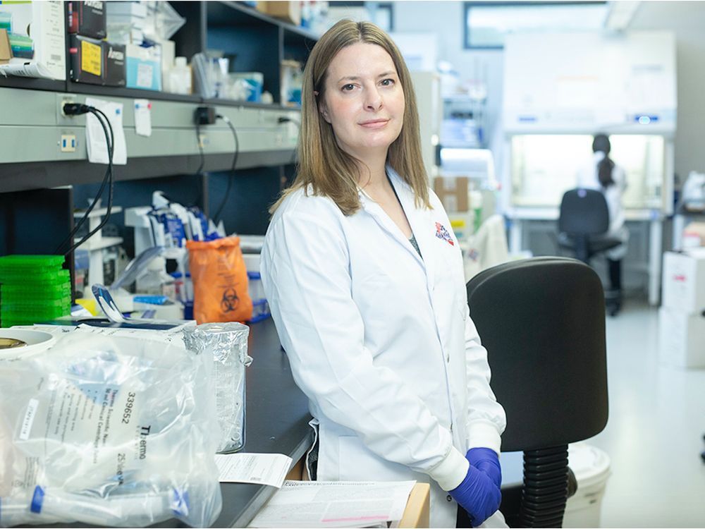 Dr. Alyson Kelvin, a scientist for the Vaccine and Infectious Disease Organization (VIDO) at the University of Saskatchewan, stands in her laboratory.