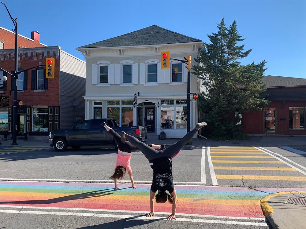 Mayor Nancy Peckford and Vice-Chair of the Health, Wellness and Fitness Advisory Committee Tanya Deans take part in the cartwheel challenge in North Grenville, which was named Canada's Most Active Community.