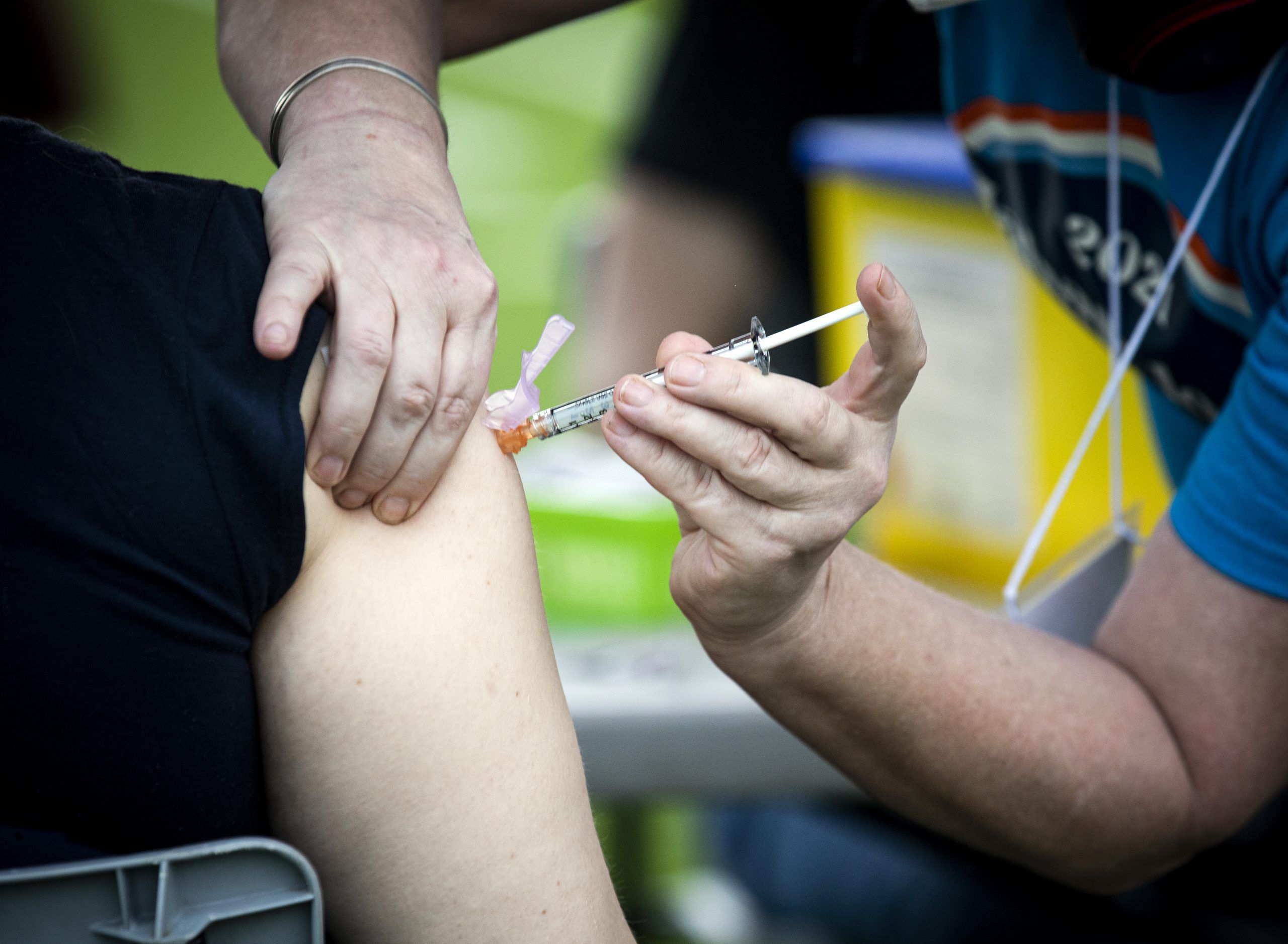 a shot of moderna vaccine being administered at a clinic on june 5, 2021 organized by dr. nili kaplan-myrth. '