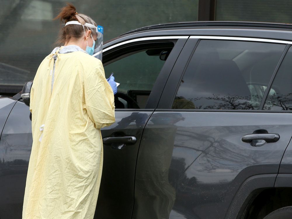 health-care workers at the richmond road diagnostic and treatment centre covid-19 testing location. friday, april 23, 2021.