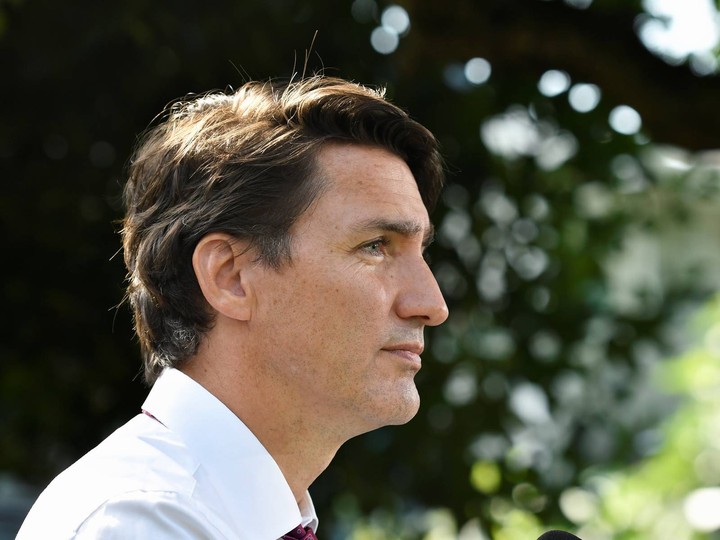  Prime Minister Justin Trudeau looks on during a news conference in the backyard of the Freedman family during his election campaign tour, in Surrey, British Columbia, Canada August 25, 2021.