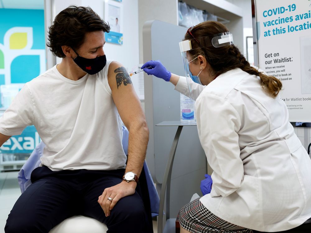 prime minister justin trudeau receives covid-19 vaccination.