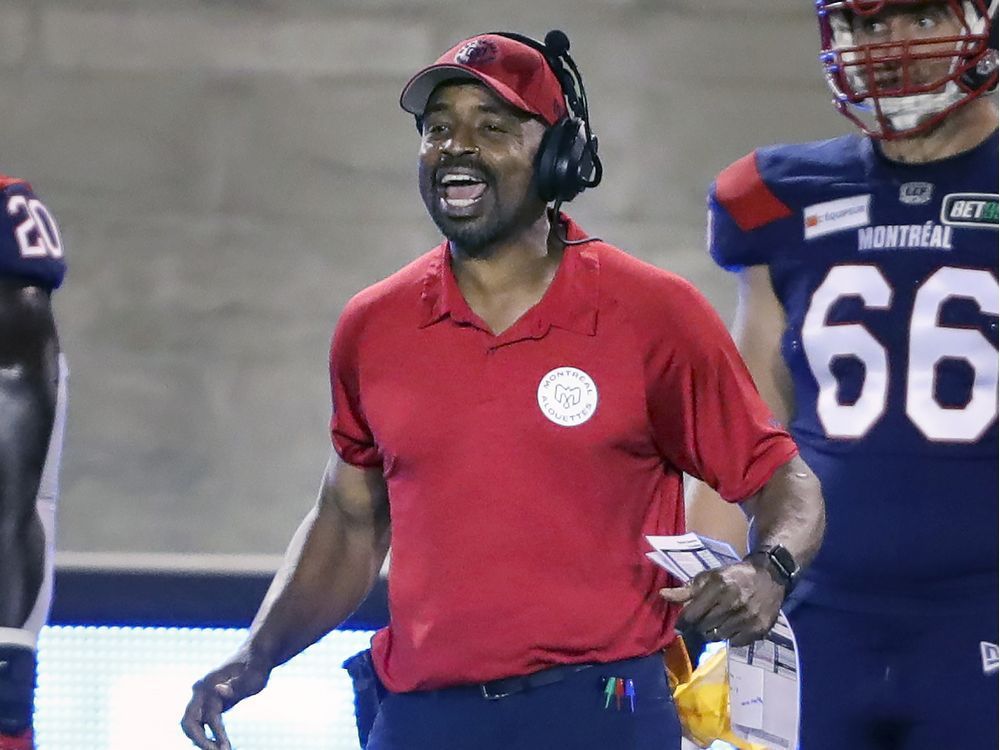 montreal alouettes head coach khari jones on the sideline during his team's canadian football league game against the hamilton tiger cats game in montreal on aug. 27, 2021.