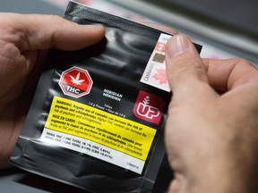 FILE: A warning label on ONE gram of cannabis is seen at Up's cannabis factory in Lincoln, Ontario.