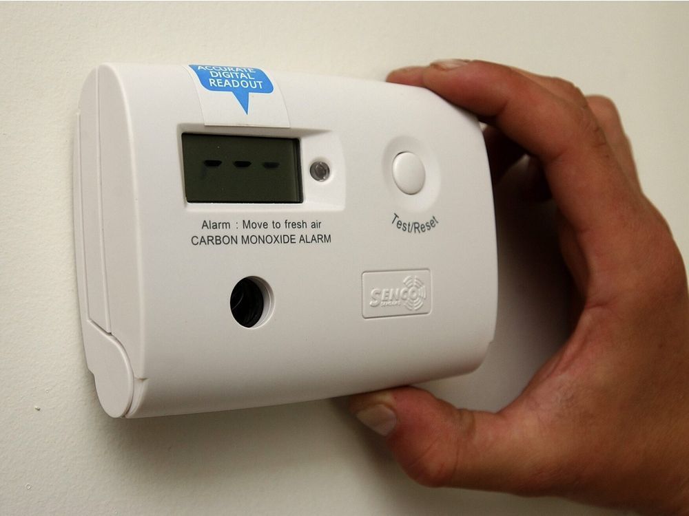 file photo of a carbon monoxide detector on wall.