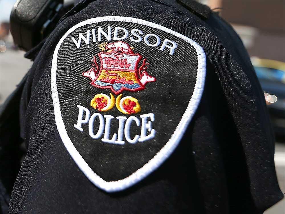 badge of a windsor police service officer.