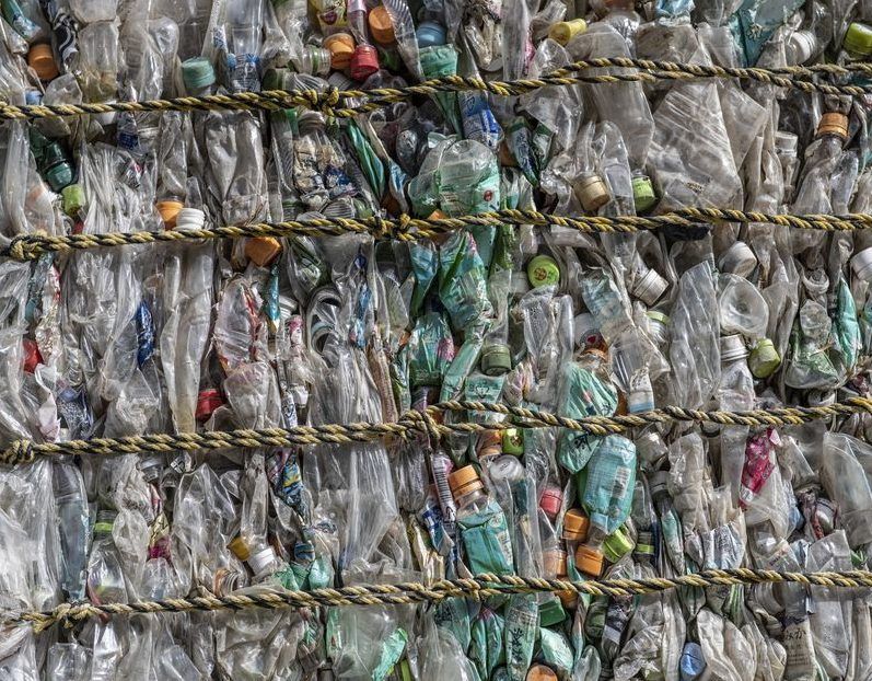 plastic bottles are compressed into a bale at asei plastic recycling company on november 5, 2020 in kasama, japan.