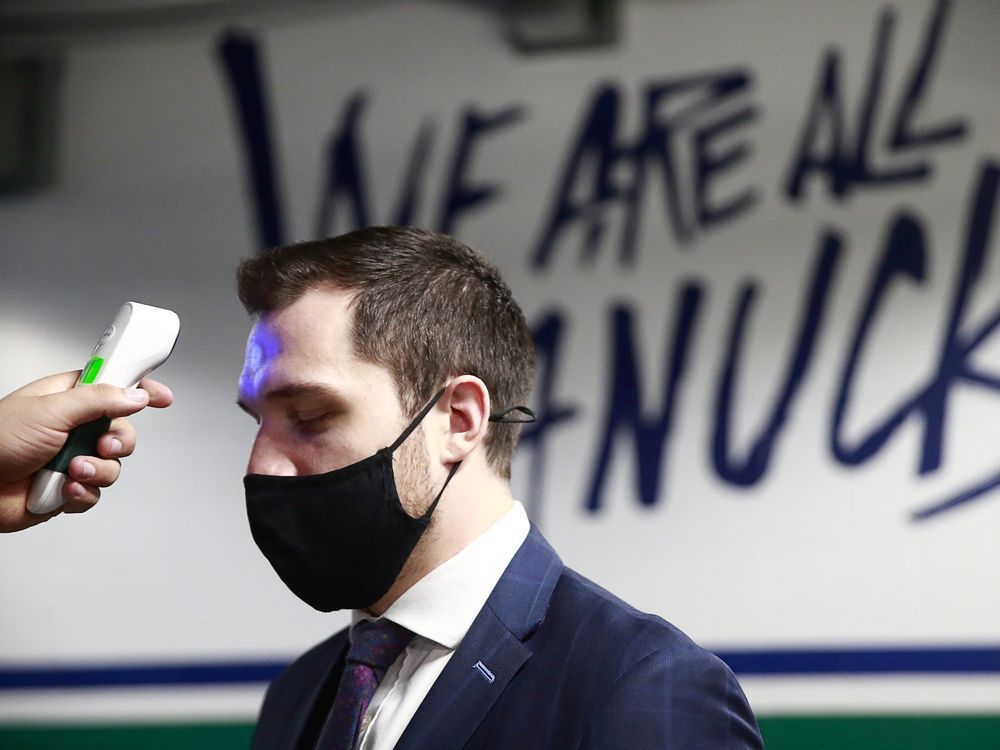 canucks captain bo horvat gets a pre-game temperature check before facing the maple leafs on march 6 at rogers arena.