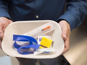 A injection kit is seen inside the newly-opened Fraser Health supervised consumption site in Surrey, B.C. Advocates say access to safe drugs can save lives. (Jonathan Hayward / The Canadian Press)