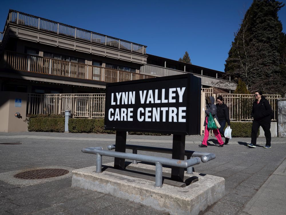 workers arrive at the lynn valley care centre seniors facility, in north vancouver, b.c., on saturday, march 14, 2020.