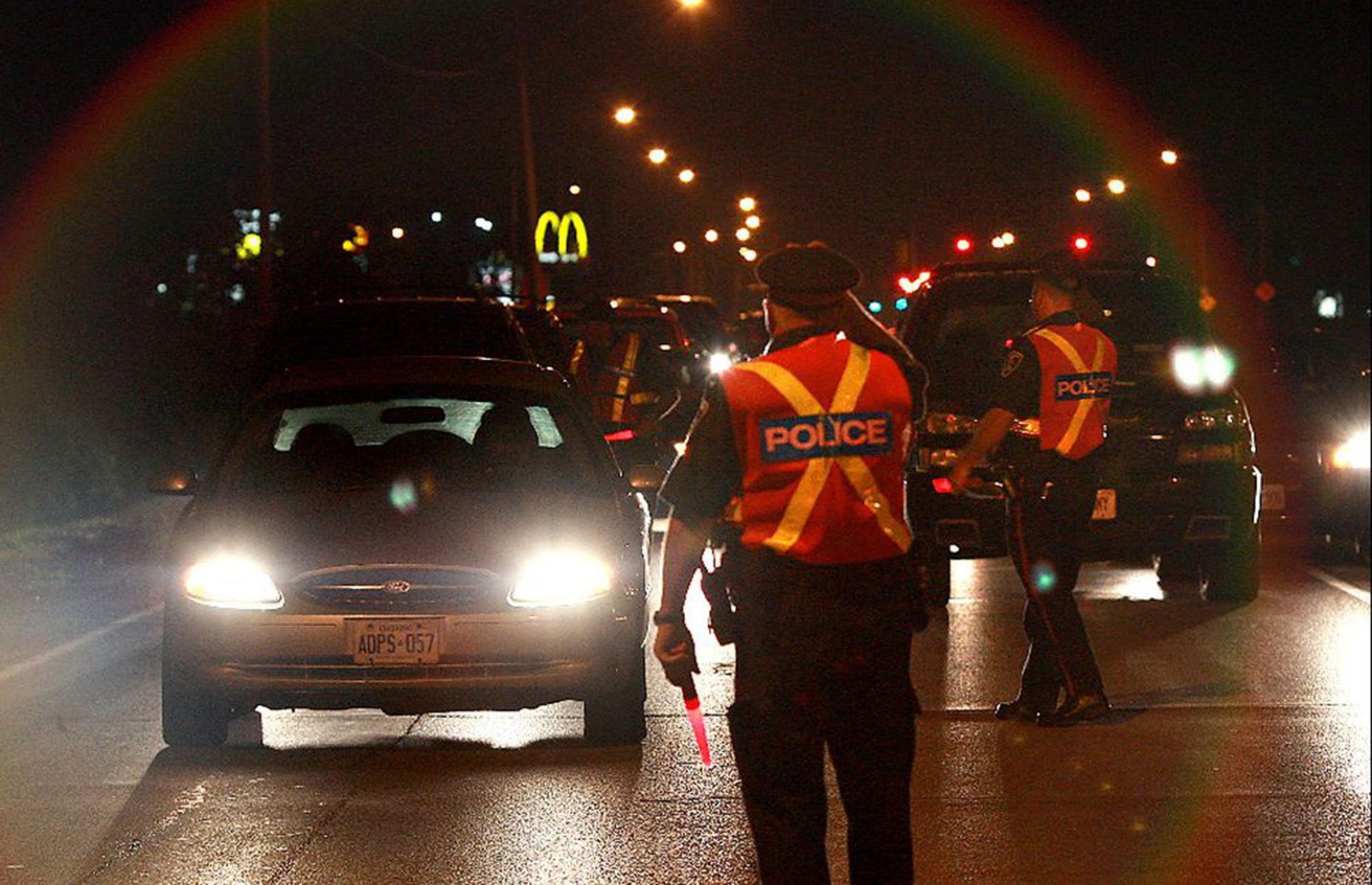 police officers stop drivers near windsor raceway on august 14, 2010 during a ride program in windsor, ont.