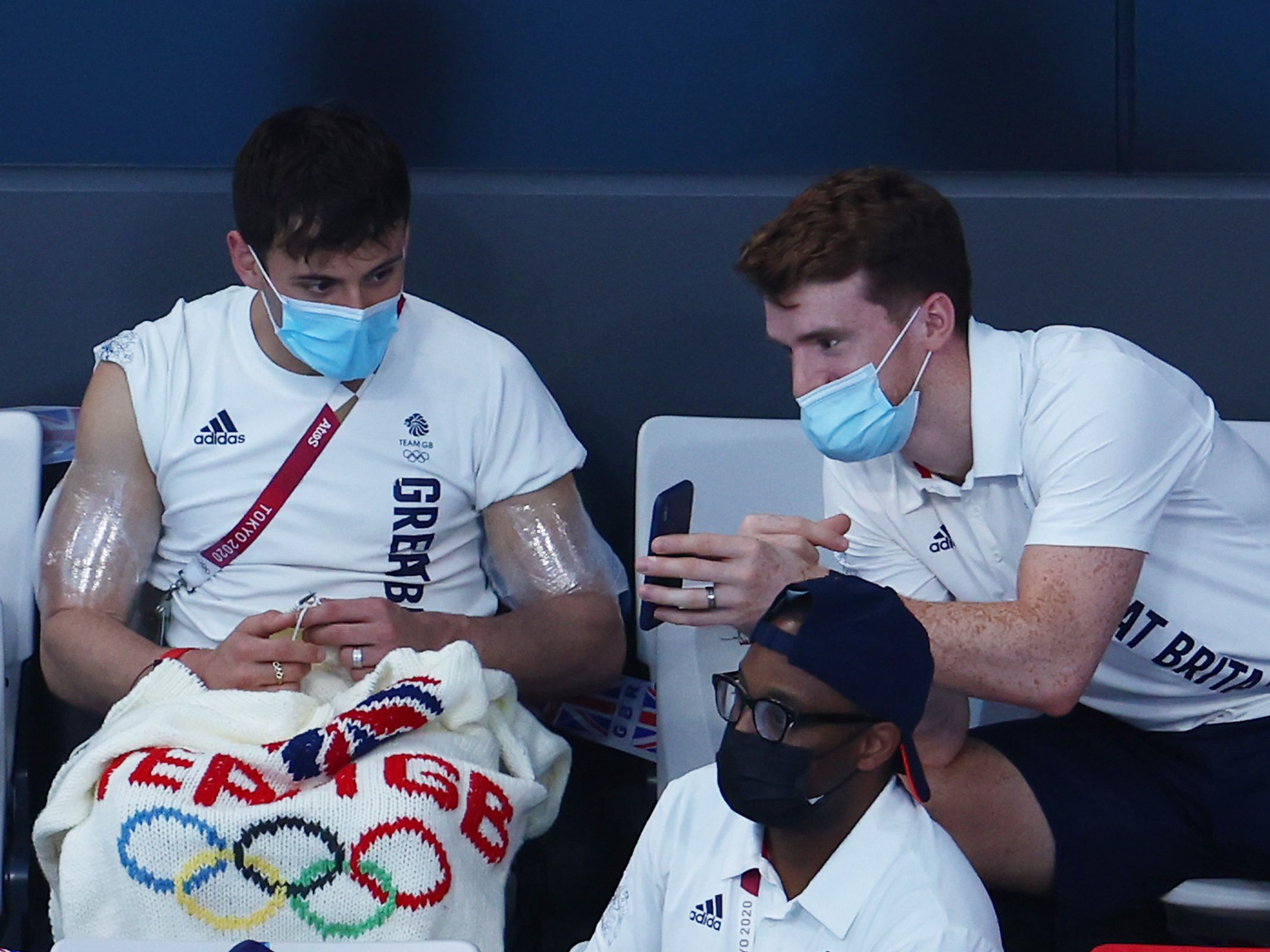 FILE: Tom Daley of Team Great Britain knits during the Men's 3m Springboard Preliminary Round on day ten of the Tokyo 2020 Olympic Games at Tokyo Aquatics Centre on Aug. 02, 2021 in Tokyo, Japan. /