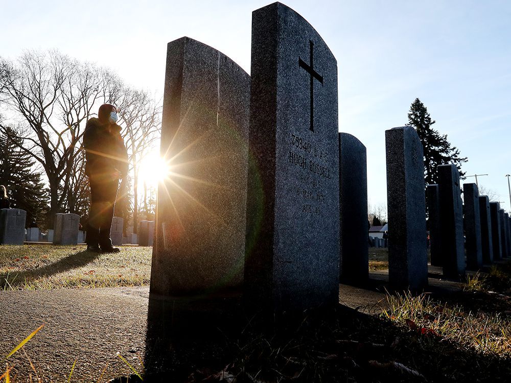 Students from Jean Forest Leadership Academy at St. Cecilia Catholic Junior High School take part in the 11th annual Remembrance ceremony for ‘No Stone Left Alone’ at Beechmount Cemetery, 12420 104 St., in Edmonton Thursday Nov. 4, 2021. Photo by David Bloom