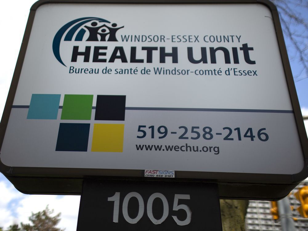 the sign in front of the windsor-essex county health unit on ouellette avenue.