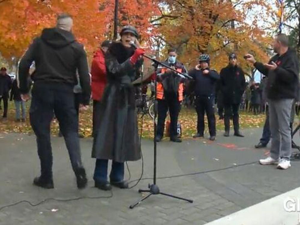a woman disrupts remembrance day ceremonies in kelowna in footage from global okanagan.