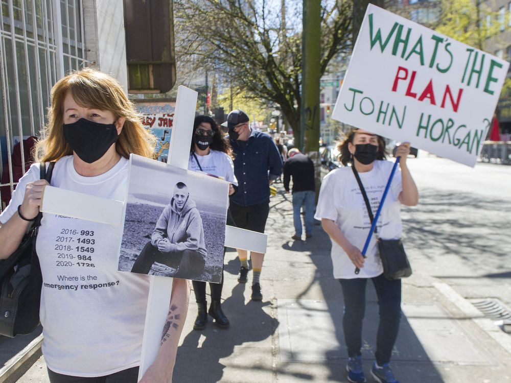 members of moms stop the harm joined others, including the drug users liberation front, march in the dtes on the fifth anniversary of b.c.'s opioid health crisis on april 14, 2021.