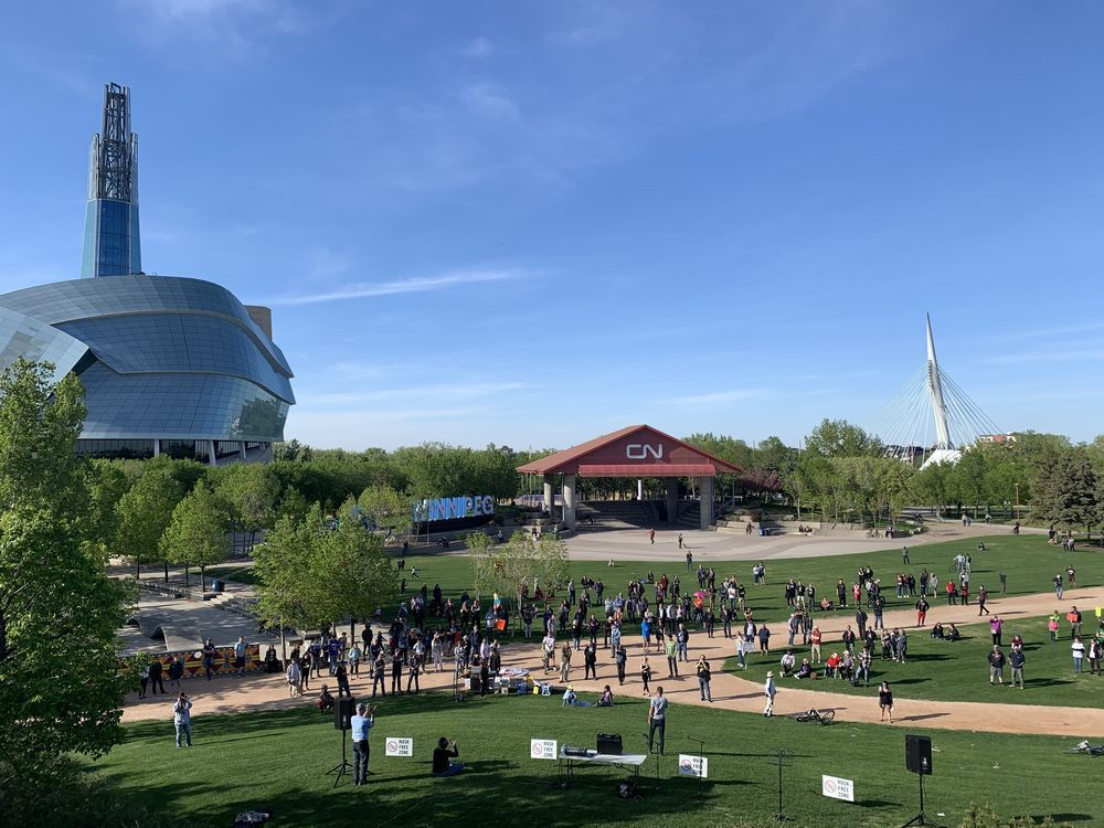 a group of anti-mask, anti-lockdown protesters gather near the canadian museum for human rights at the forks in winnipeg earlier this year.