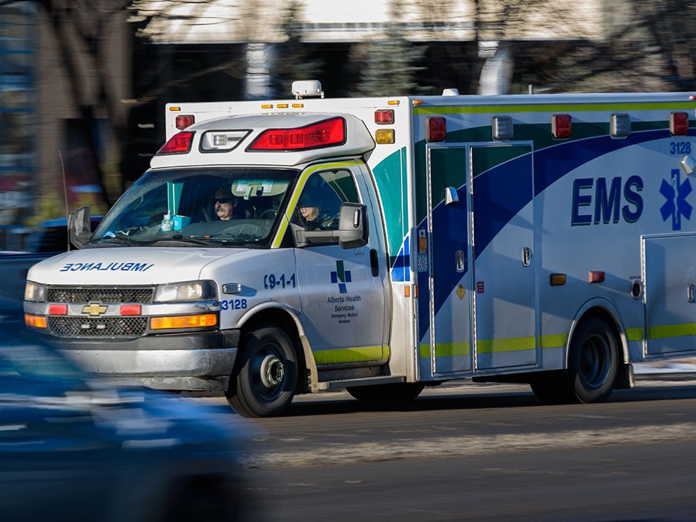 an ambulance heads toward the foothills medical centre on monday, dec. 6, 2021.