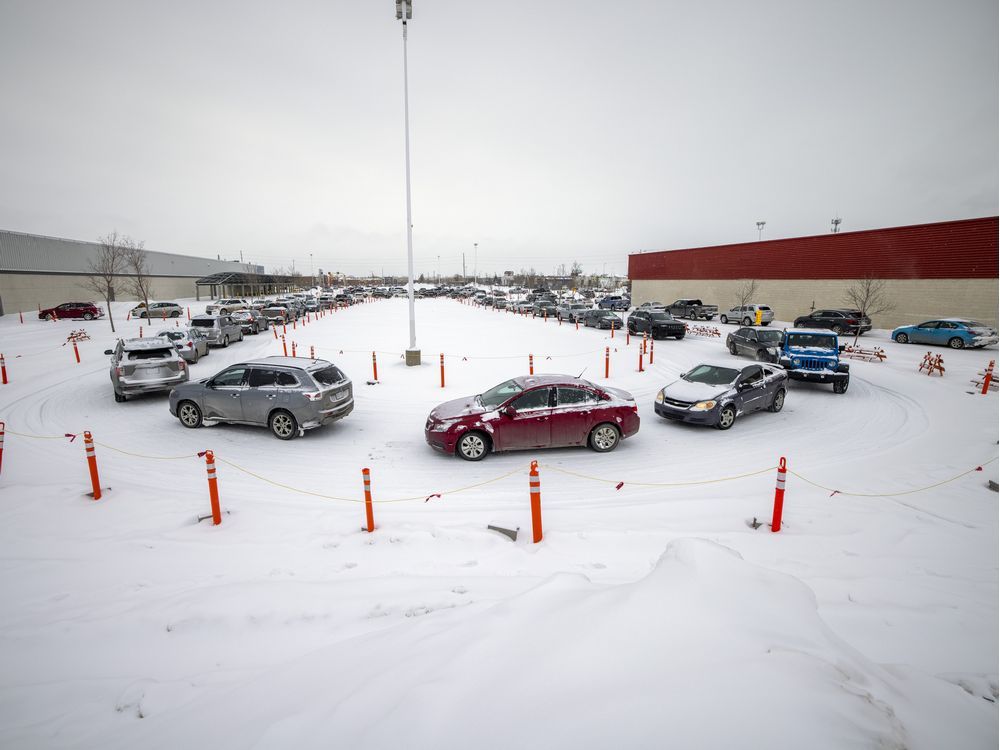 the lineup to for the drive-thru covid-19 testing at the old costco building extended well beyond the parking lot and spilling all the way back along victoria avenue on tuesday, january 4, 2022 in regina.