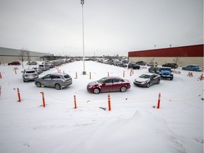 The lineup to for the drive-thru COVID-19 testing at the old Costco building extended well beyond the parking lot and spilling all the way back along Victoria Avenue on Tuesday, January 4, 2022 in Regina.