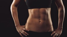 Not having visible abs doesn’t mean someone is unfit or weak. woman with abs
