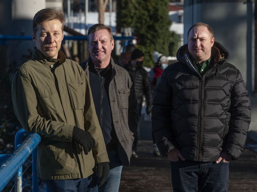 TOGETHER COVID researchers (from left to right) Dr. Kristian Thorlund, Dr. Ed Mills and Dr. Jamie Forrest at Granville Island in Vancouver on Friday, Dec. 31, 2021.