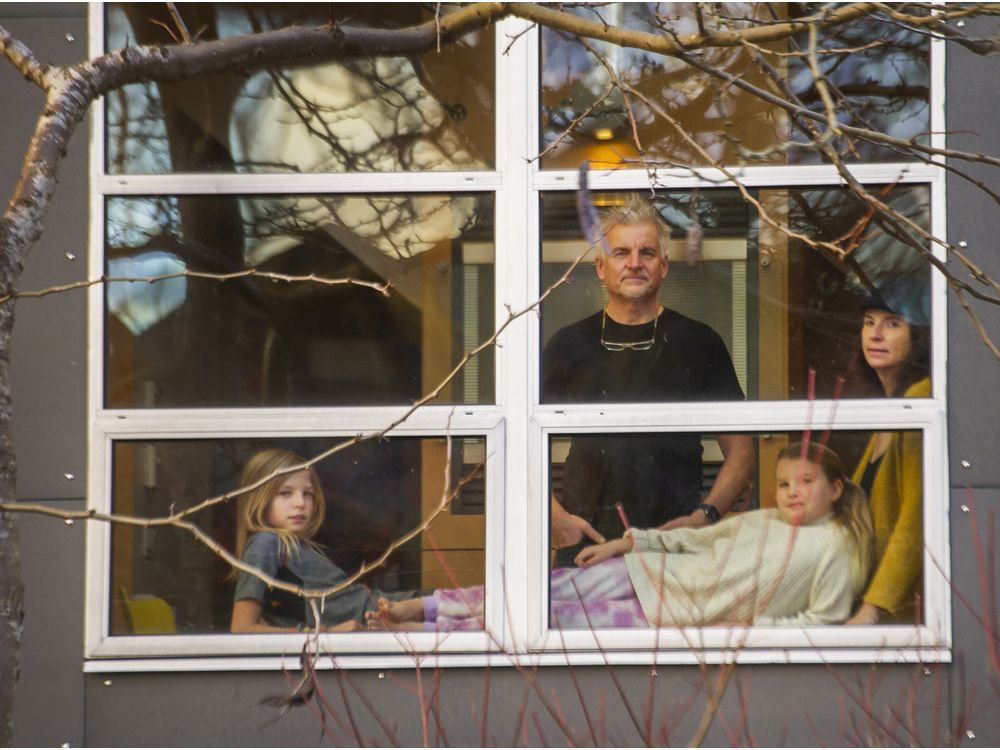 The ‘transparency of buildings’ is crucial, says Vancouver architect Bruce Haden, at home with wife Holly and children Griffin, left, and Samaya, right. ‘You want a sense of what’s going on in the outside world.’