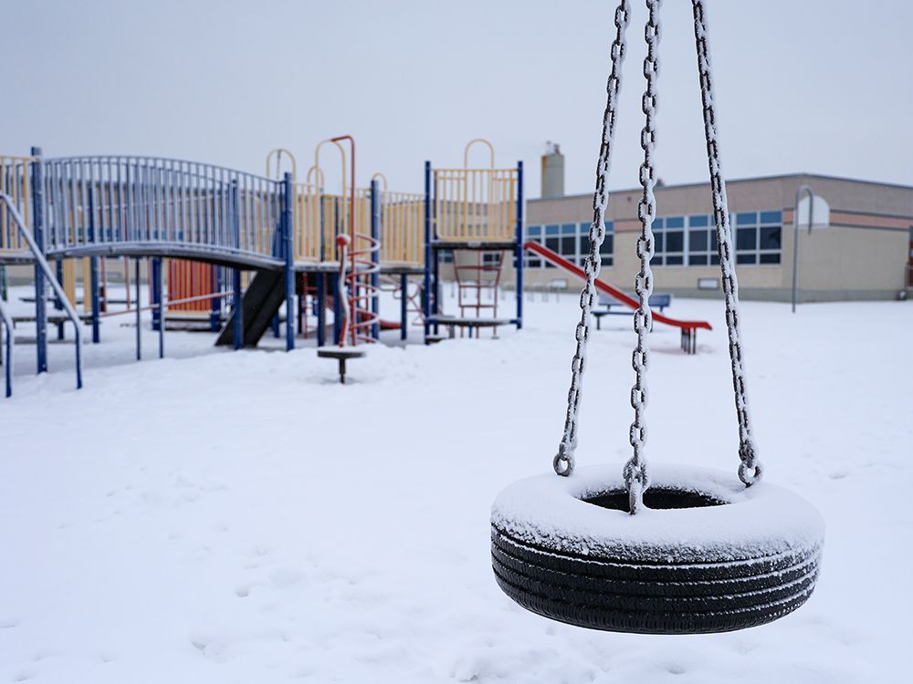 a snow-covered playground at mount view school in northeast calgary. the christmas break has been extended to jan. 10 as covid-19 cases spike in alberta.