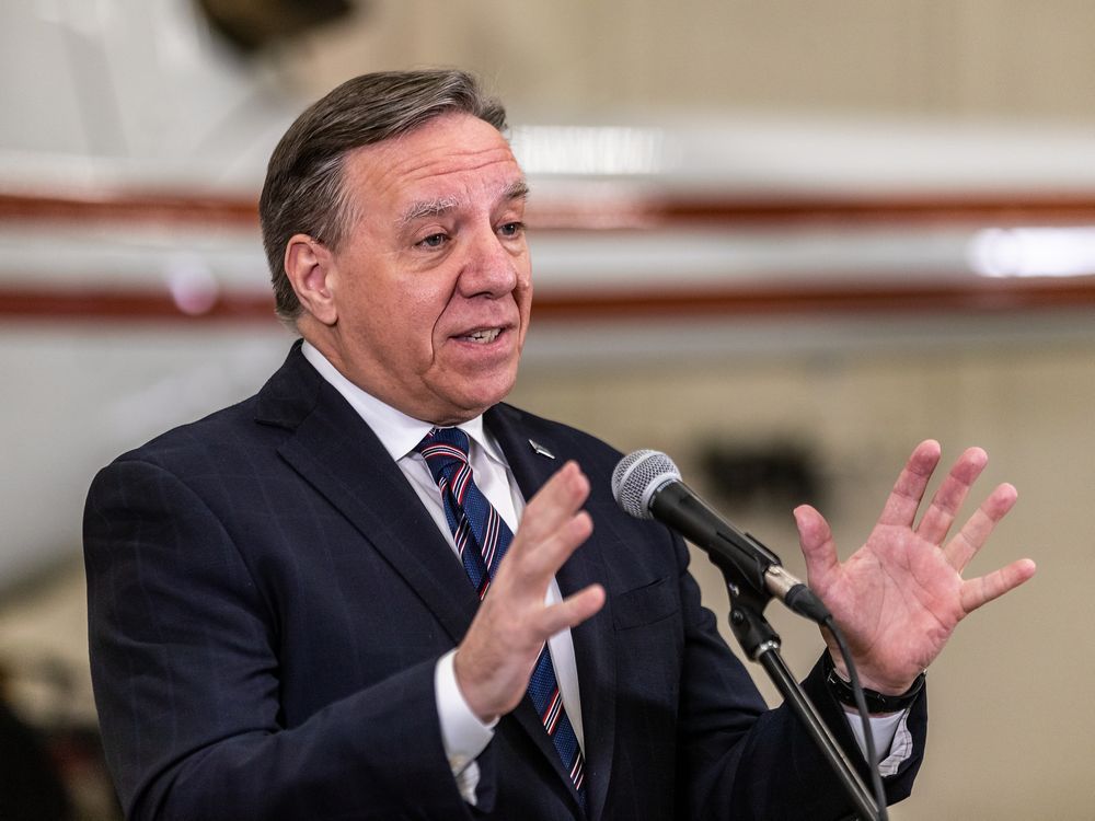 “We’re taking a calculated risk to learn how to live with the virus, and the best way to live with the virus is to get your three doses of vaccine,” says Premier François Legault, seen in a file photo.