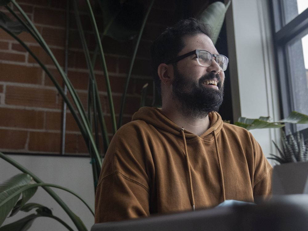 mark shmelinski who co-owns the everyday kitchen sits for a portrait at the coffee shop on friday, february 4, 2022 in regina.