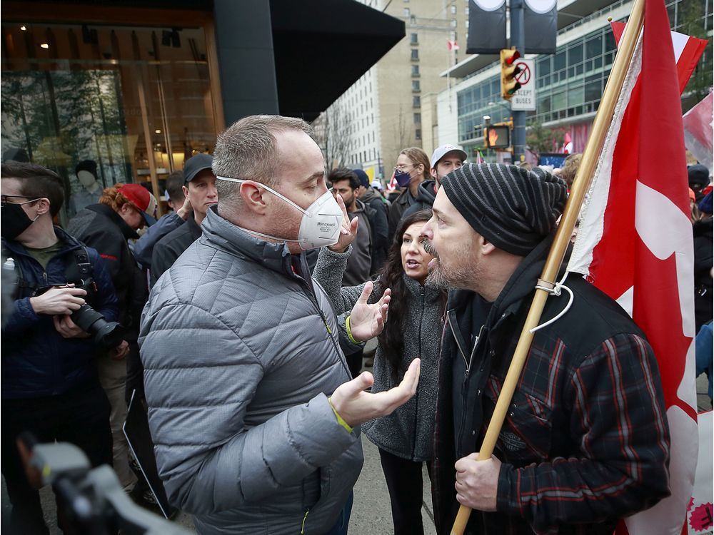 Protesters clash as thousands gathered downtown during a Covid demonstration in Vancouver February 5, 2022.