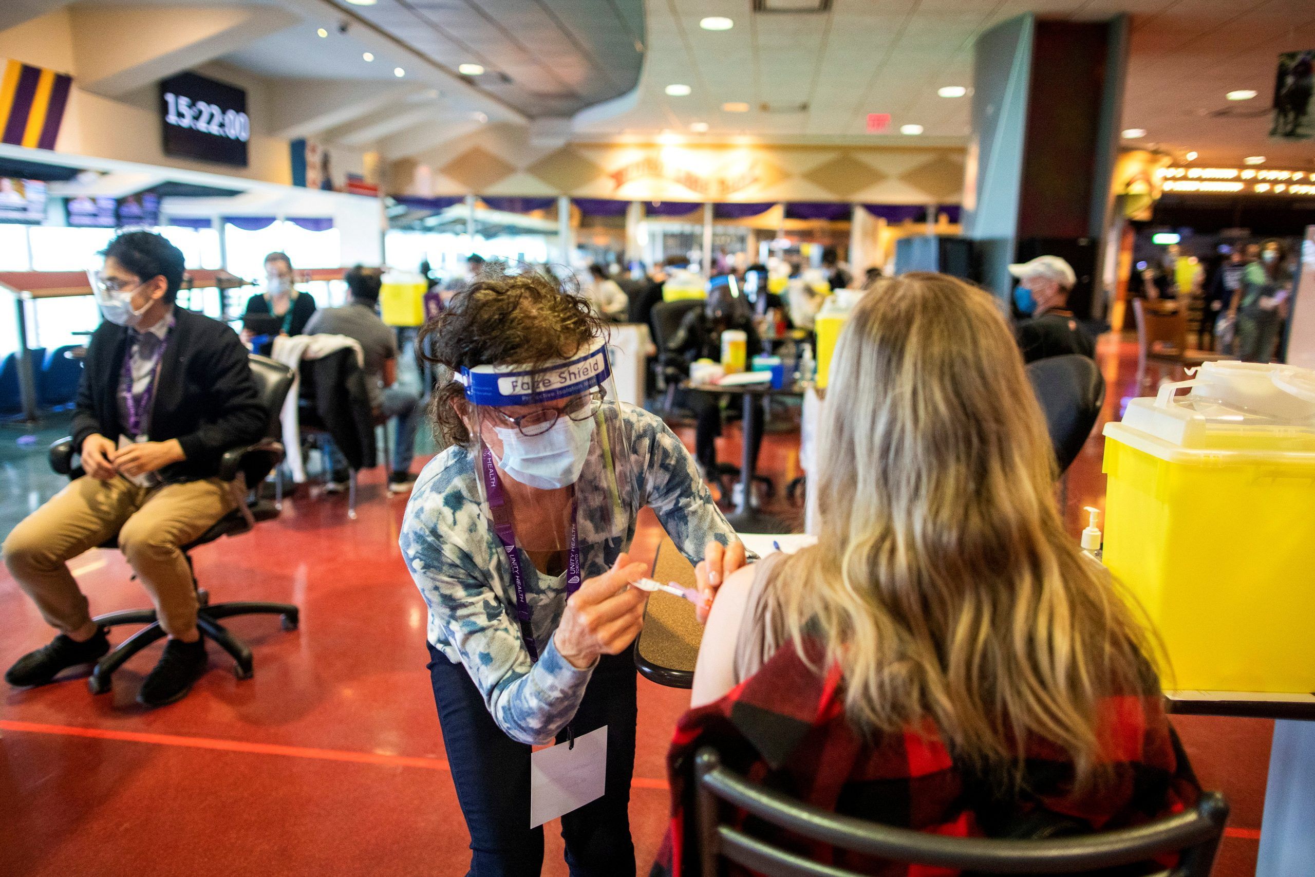 A health-care worker administers the Pfizer/BioNTech coronavirus disease (COVID-19) vaccine at Woodbine Racetrack pop-up vaccine clinic in Toronto May 5, 2021.