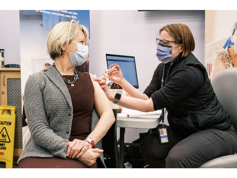 Provincial health officer Dr. Bonnie Henry receives her first dose of vaccine on Dec. 23, 2020.